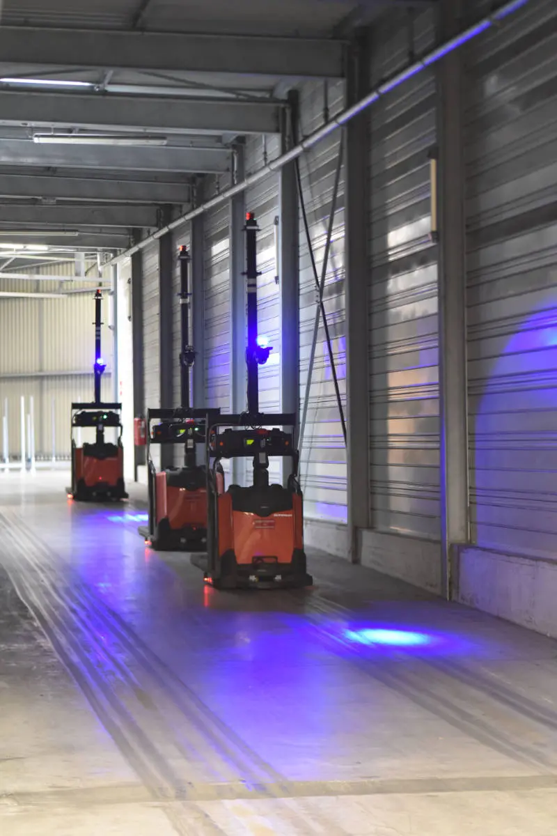 Robots qui dispatchent les vélos dans la zone de stockage